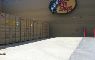 image of storage containers infront of Bass Pro Shops store