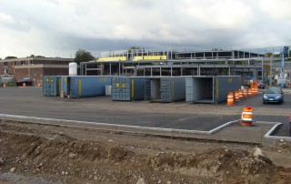 image of storage containers on a parking lot