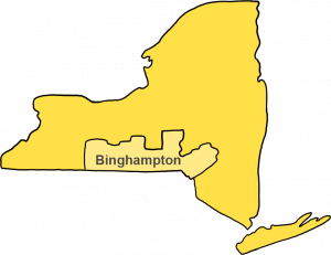A simplified yellow map of New York State with the Binghamton area highlighted, on a black background.