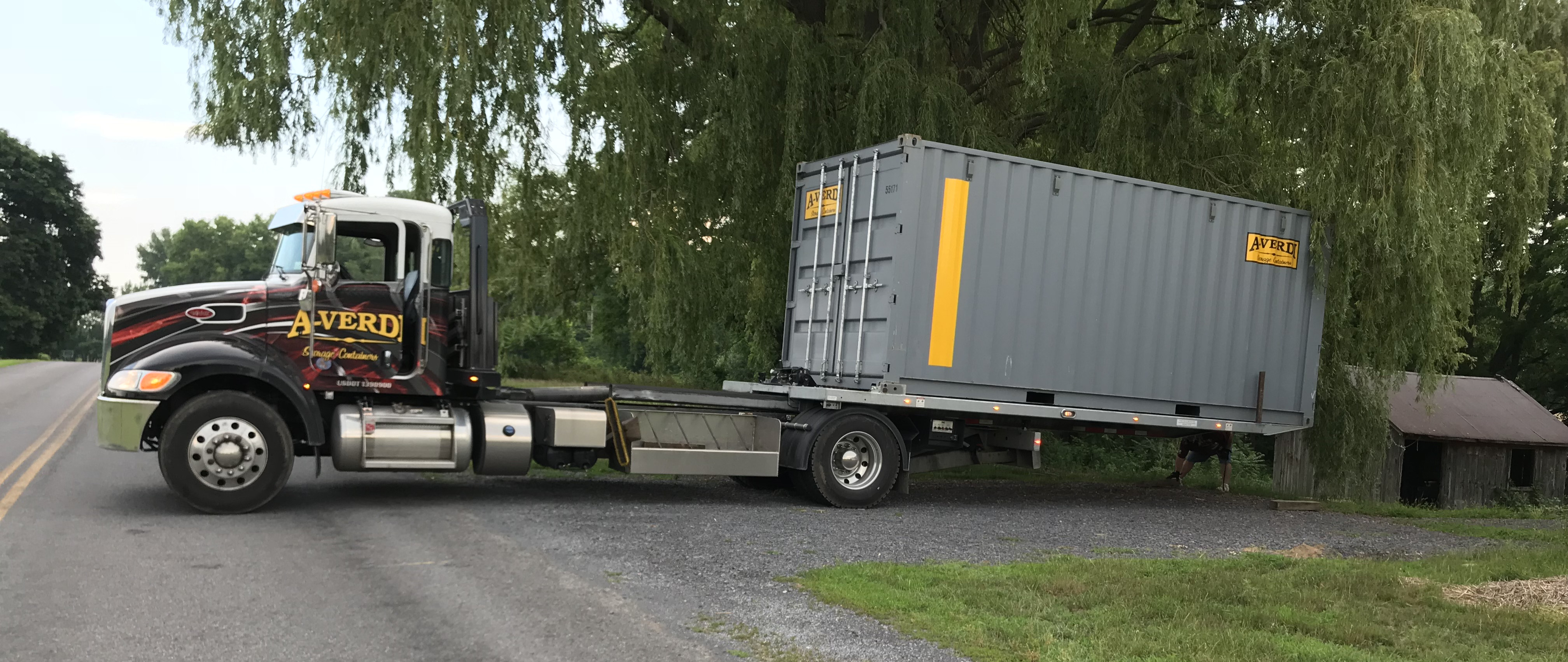 Truck delivering storage container 